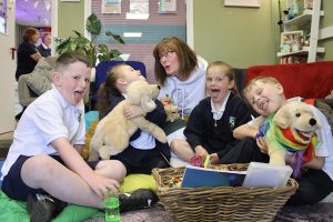 Children laughing with Bamber
